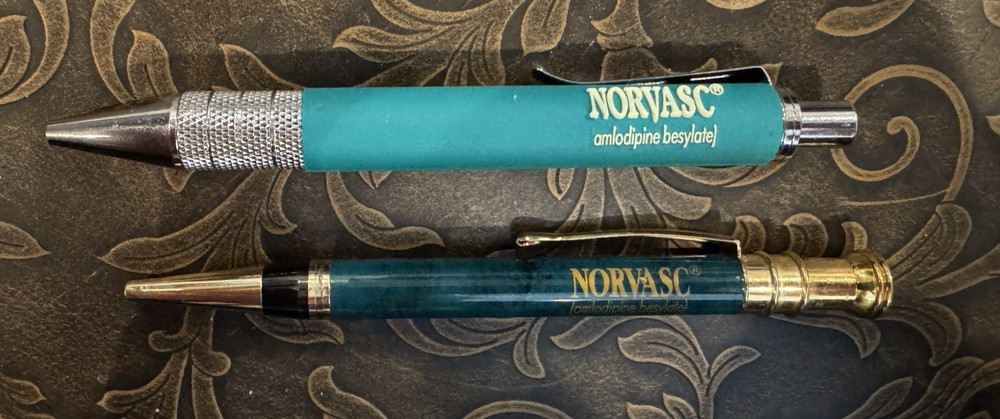 Norvasc Heavy Metal Drug Rep Pens Click button, black ink