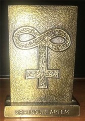 Tinactin Secundum Artem Symbol for Glass Bronze Paperweight