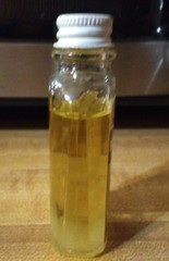 Vtg CUNNINGHAM Sweet Oil Emollient 1oz Glass Mini Glass Bottle 3/4 Full PROP TAG
