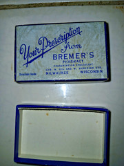 PILL BOX FROM BREMERS PHARMACY MILWAUKE VINTAGE 2 3/4 X1/3/4 X1/2″