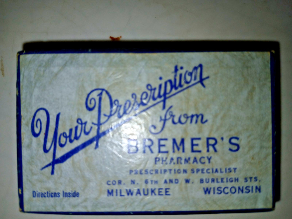 PILL BOX FROM BREMERS PHARMACY MILWAUKE VINTAGE 2 3/4 X1/3/4 X1/2″