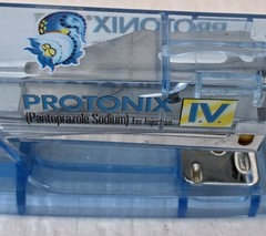 Protonix I.V. STAPLER Drug Rep Pharmaceutical Promo Advertising Gerdie Monster