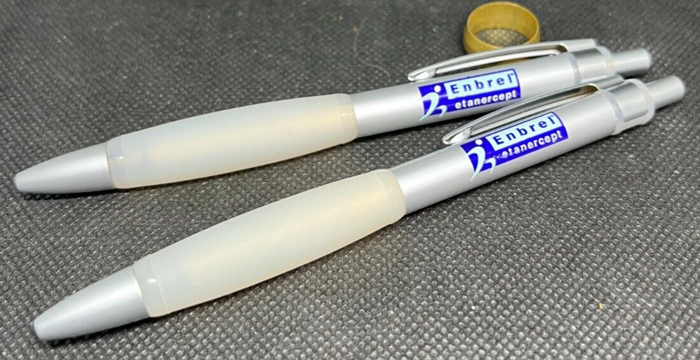 LOT of 2 ENBREL Heavy Metal Medical Drug Rep Pharmaceutical Pens Advertising
