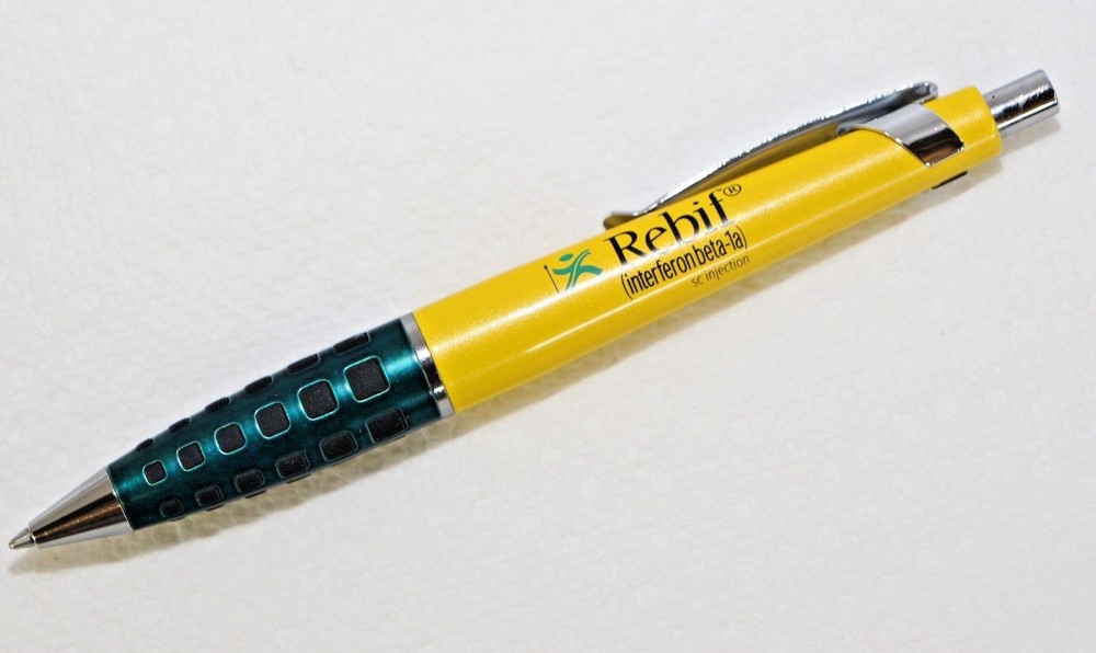 Heavy Metal REBIF Pharmaceutical Pen Yellow and Green New in Sleeve Torpedo