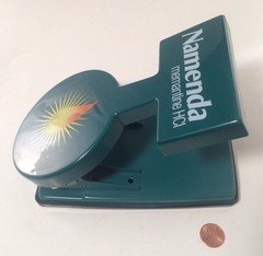 Namenda Pharma Drug Rep Green Two Hole Punch Office Desk Vintage – NICE RARE