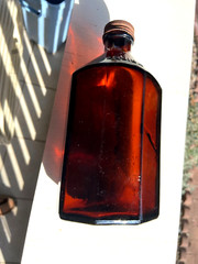 BEAUTIFUL Antique Amber Squibb embossed Glass Drug or Pharmacy Jar, 7“ Tall