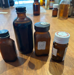 4 glass medicine bottles, Thyroid, Iodin ration, Pyridium Tri-Sulfa, Toryn Syrup
