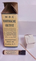 Vintage Manhattan Drug Co. Toothache Outfit with vial, applicator, and box.