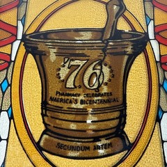SECUNDUM ARTEM ’76, PHARMACY CELEBRATES AMERICA’S BICENTENNIAL STAINED GLASS