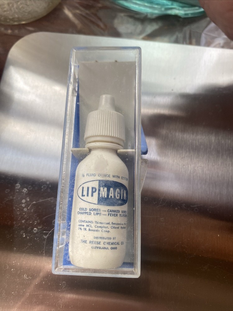 Vintage Bottle Of LIP MAGIK. Full*Unopened Bottle In Original Cont. W/cotton.