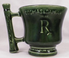 McCoy Cosmas & Damien Mug Mortar & Pestle Green Pottery Advertising Schering