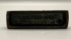 Vintage Tinactin Pharmaceutical Sulphur Symbol Metal Paperweight (1981)