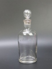 Antique clear medicine bottle with stopper medium size