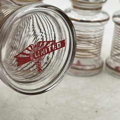 4- VTG WW2 APOTHECARY Jar Glass Medical Canister Winged United Logo Medicinal