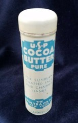 Old Advertising Medicine Tin USP Pure Cocoa Butter Woltra Co NY Push Dispenser