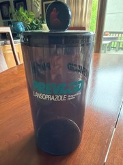 Pharmaceutical Drug Rep Collectibles: Prevacid branded smoky gray container