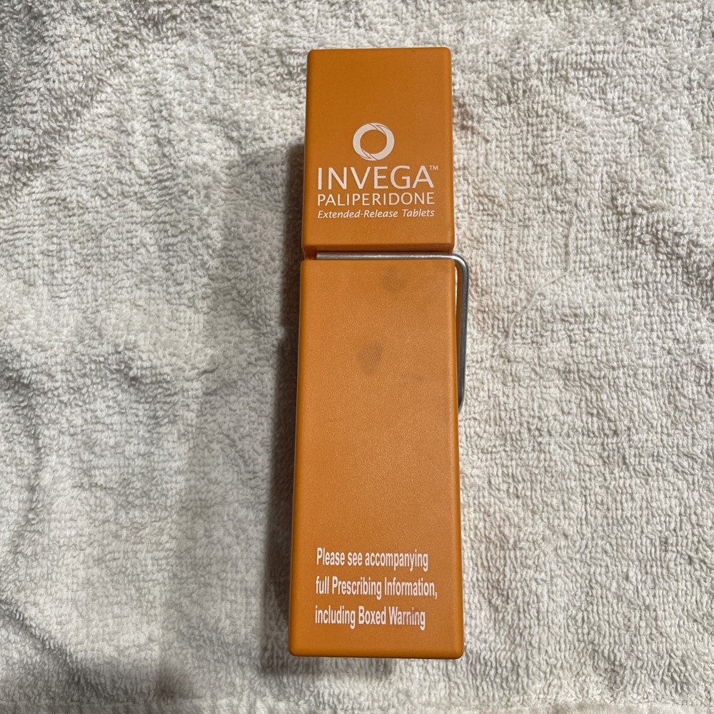 Medical Advertisement Promotional Invega Paliperidone XL Orange Clothespin Desk