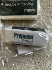 Lot Of 3 -Rare Propecia PEN ON STRING, Hair Brush, Magnet Clip-All Wrapped Merck