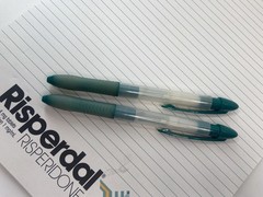 Lot of 2 Risperdal Medical Drug Rep Pharmaceutical Pens White Green And Notepad