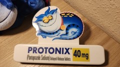 Vtg Protonix Magnet Clip Pharmaceutical Rep Advertisement With Plushy
