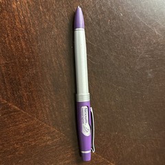 Nexium collectible silver purple clock and pen