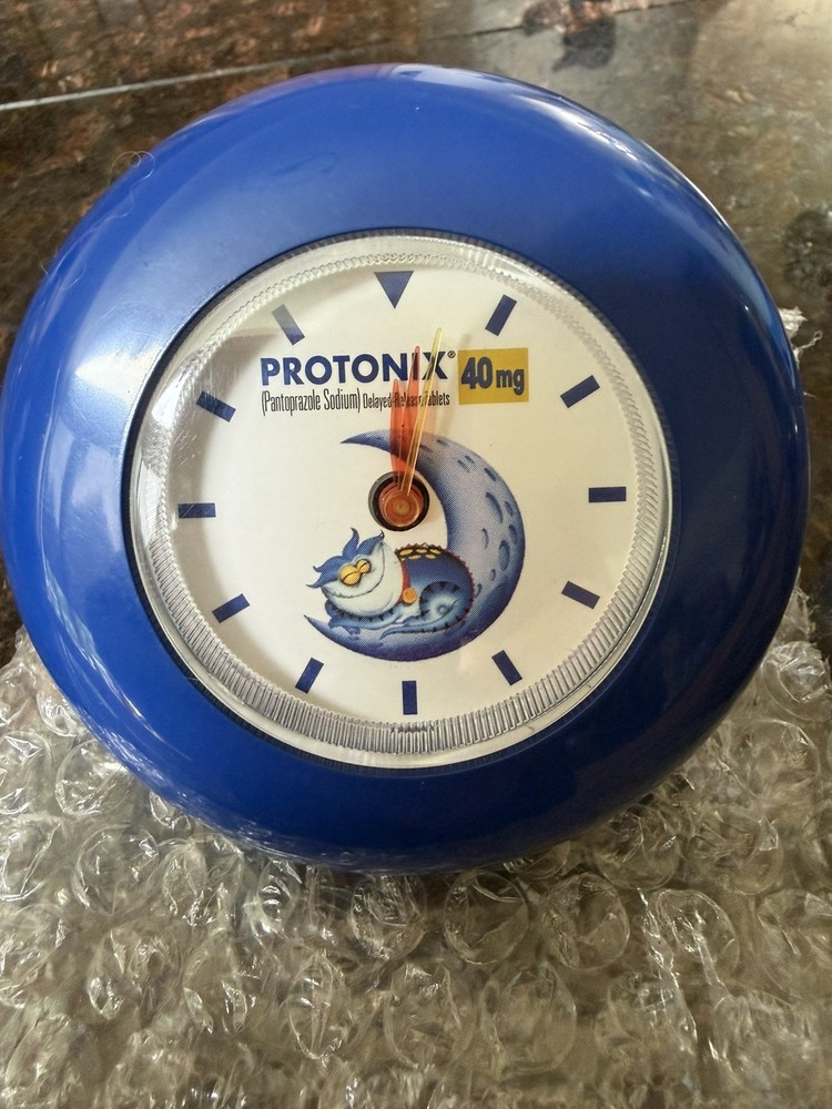 Vintage Protonix Hydrolic Clock Drug Rep Pharmaceutical NEW & RARE!