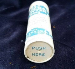 Old Advertising Medicine Tin USP Pure Cocoa Butter Woltra Co NY Push Dispenser