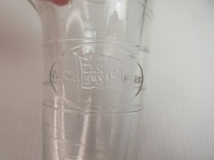 1930’s ENSIGN UK Footed Glass Embossed APOTHECARY MEASURE BEAKER Ounces & Drams