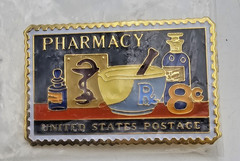 Allen & Hanburys Pharmacy United States Postage Stamp Enamel Lapel Pin Vintage