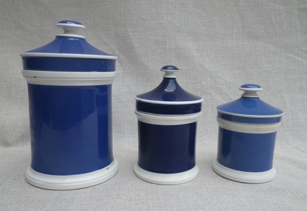Collection of Small Blue Slip-Decorated Ceramic Apothecary Jars with Lids