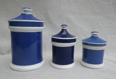 Collection of Small Blue Slip-Decorated Ceramic Apothecary Jars with Lids