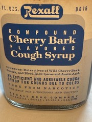c1950s Compound Cherry Bark flavored Cough Syrup Rexall Drug Company Bottle