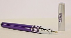 Pharmaceutical Heavy Metal NEXIUM Purple and White New in Sleeve