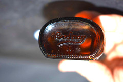 Vintage Medicine Bottle, Amber Glass, Sani-Glass with Black Lid, 4″ Tall