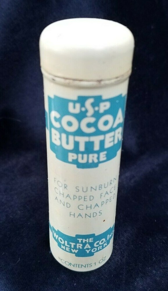 Old Advertising Medicine Tin USP Pure Cocoa Butter Woltra Co NY Push Dispenser