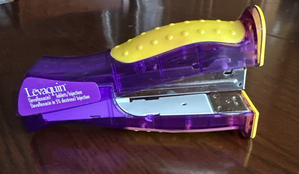 Levaquin Leva-pak collectible purple and yellow stapler EUC
