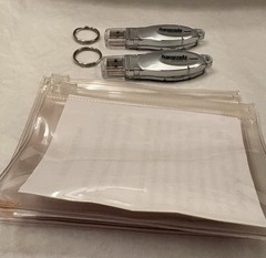 VTG LOT OF 2 NAMENDA USB FLASH MEMORY DEVICES + KEYRINGS PHARMA REP LOGO NEW