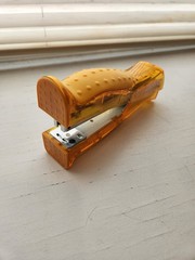 Zegerid yellow Drug Rep Promotional Item Stapler 4-7/8″ long, new without box