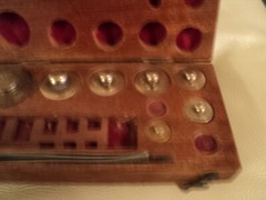 ANTIQUE BRASS JEWELLER WEIGHTS IN ORIGINAL WOODEN CASE MISSING FEW OF THEM