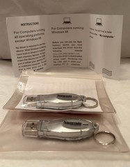 VTG LOT OF 2 NAMENDA USB FLASH MEMORY DEVICES + KEYRINGS PHARMA REP LOGO NEW