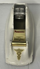 Vintage Permacel Advertising Medicine Cast Iron Desk Tape Dispenser. White