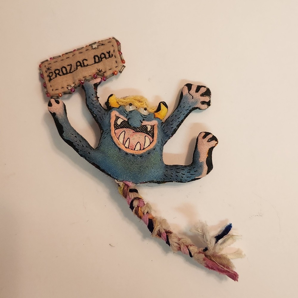 Vintage Hand Made “ Prozac Day “ Cloth Stuffed Goblin Monster Googley Eyes Pin