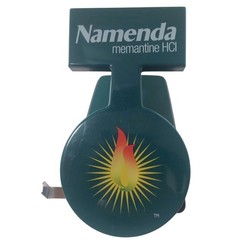 Namenda Memantine HCl Pharma Promo 2-Hole Punch Teal Green Sunburst Logo Vintage