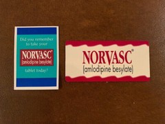 Drug Rep large Magnetic Norvasc business card holder and 2 Norvasc magnets.