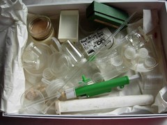 Collection interestesting scientific glassware dishes, slides, tubes