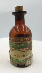 BW – 1920’s Magnus, Mabee & Reynard Oil of Nutmeg 3 1/4 “ Amber Medicine bottle